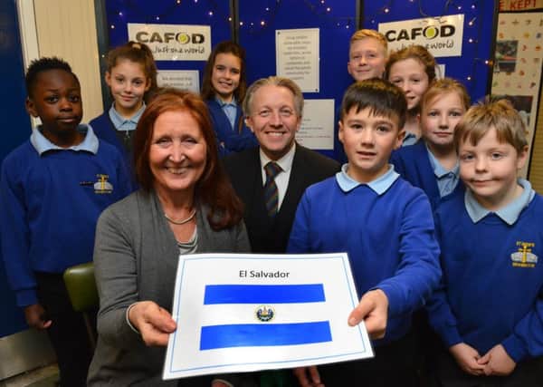 St Bede's RC Primary Academy pupils with CAFOD representative Clare Dixon and headteacher Dominic Curran.