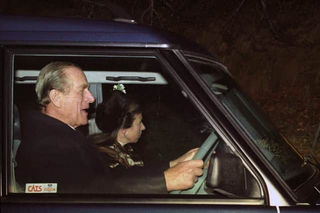 The Duke of Edinburgh driving his daughter, the Princess Royal, to her wedding ceremony at Crathe Church in 1992. Picture: PA.