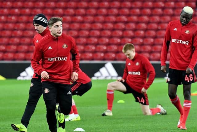 Lynden Gooch warming up ahead of the win over Manchester City.