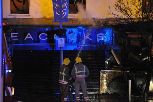 Firefighters have been at the scene of the Peacocks blaze in Blandford Street, Sunderland, all night. Pic: Tim Richardson.