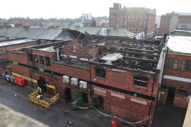 A view of the damage to the roof.
