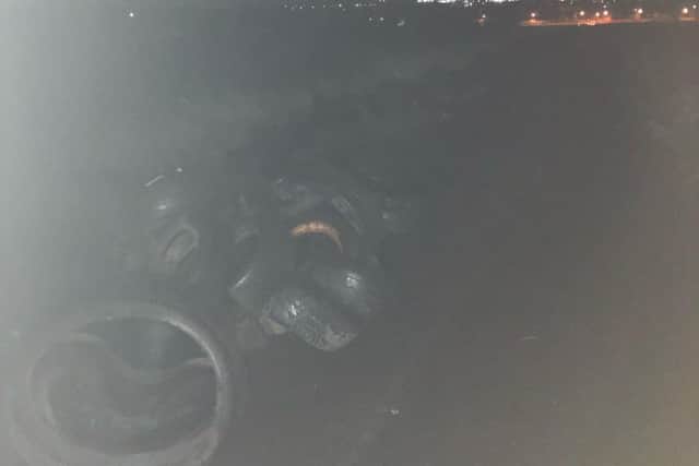 Tyres dumped on the road. Picture by Robert Irvine.