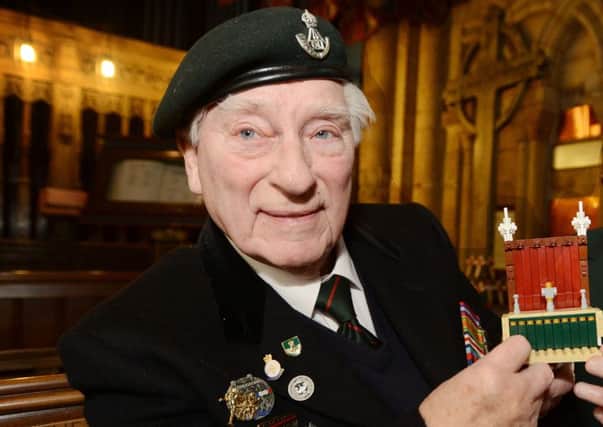 Normandy Veterans from the Durham Light Infantry Asscociation, Charles Eagles and Dicky Atkinson visit Durham Cathedral to help build a lego replica.