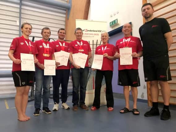 Left to right: Imogen Fife, Ian Whyte, Mark Robinson, Dave Hills, Lindy Woodrow, Norman Stephenson and coach Constantin Cosmin Petcu.
