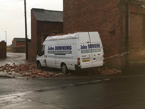 The gable end of The Hendon Grange collapsed onto a van parked outside.