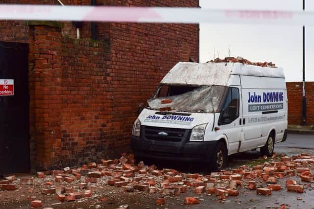 The gable end of The Hendon Grange collapsed onto a van which was parked outside the pub.