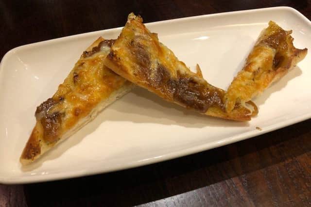 Cheese garlic bread with pulled beef starter.