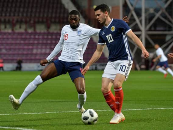 Lewis Morgan in action for Scotland Under-21s
