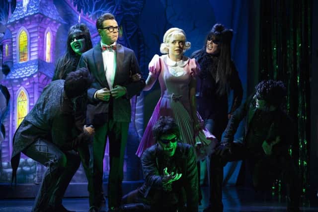 Ben Adams as Brad and Joanne Clifton as Janet