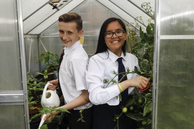 Pupils Patrick Wilson, and Sofia Magpuyo members of the winning team in the RHS School Gardeners of the Year Competition. Picture by 
RHS / Luke MacGregor