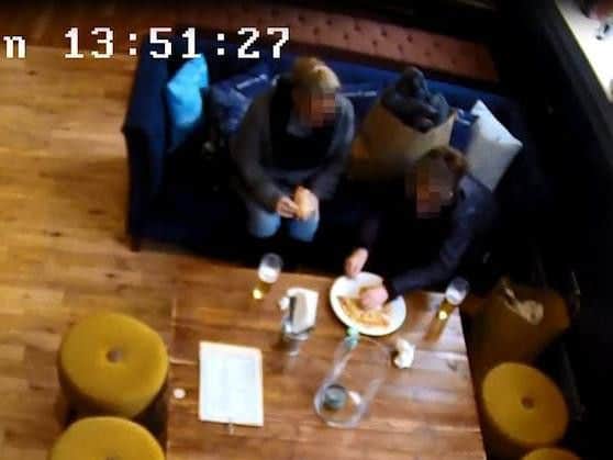 The pair start to put hair on the pizza they ordered in The Peacock