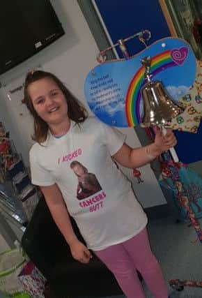 Sophie Laidler rings the bell at the RVI following the completion of her chemotherapy treatment.