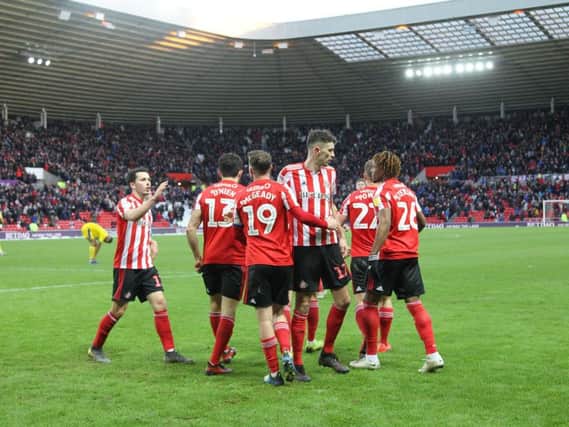 The Sunderland team celebrate Aiden McGeady's winning goal.