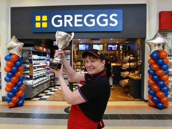 Donna Flood with the Best Greggs Shop in the UK trophy which the Bridges store she manages has won.