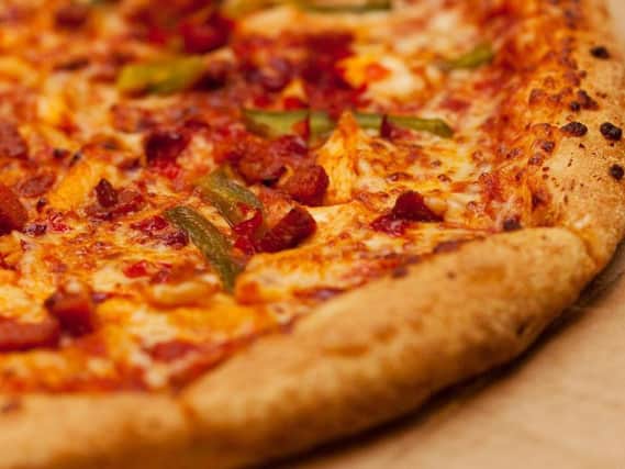 Two women tried to scam a free meal at a Sunderland pub by putting hair in their pizza.