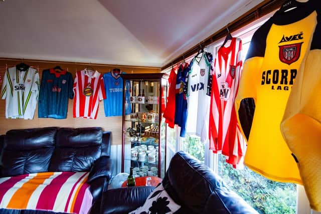 Peter Heslop's collection of sports shirts with Vaux logos.
