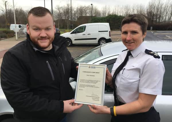 Paul Johnston receives his commendation from Chief Superintendent Sarah Pitt.