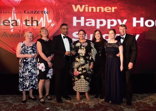 GP/GP Practice of the Year Award winners Happy House Surgery receive their award from Ken Bremner Chief Executive City Hospitals NHS FT & South Tyneside NHS FT.