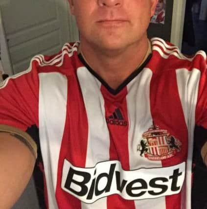 Anders in his Sunderland shirt.