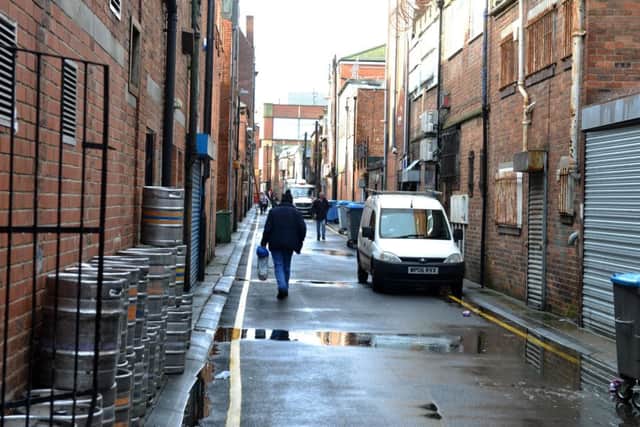 The back lane is being used  to access to Blandford Street following the Peacocks fire.