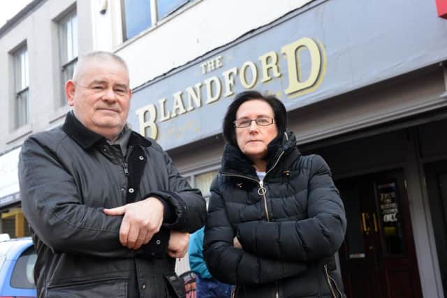 Blandford pub tenants Ken Craigs and Liz Riley.