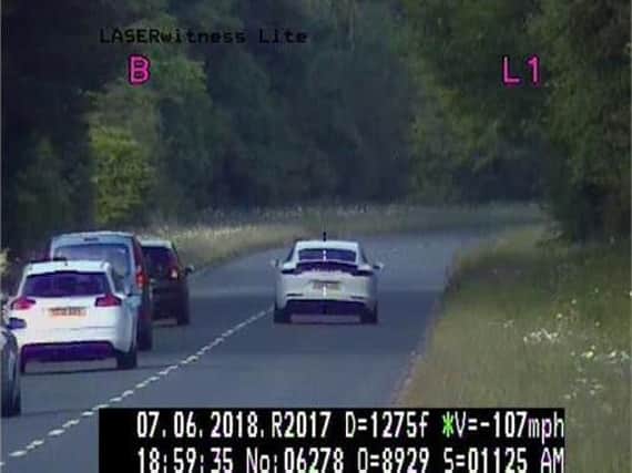 A police image clocking the white Porsche travelling at 107 miles per hour.