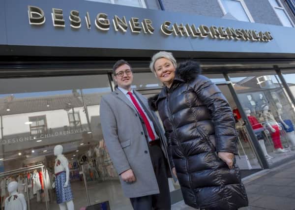 Designer Childrenswear owner Brenda Coade with Coun Michael Mordey
