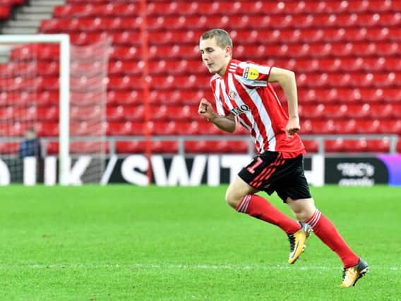 Sunderland's Lee Connelly scored twice against Peterborough as Sunderland U23s reached the knockout stages of the Premier League Cup.