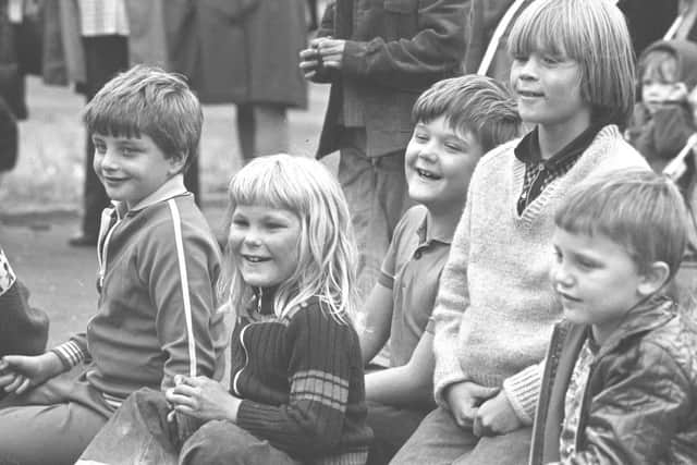 Children enjoying an open air theatre performance at Burleigh Garths in 1976.