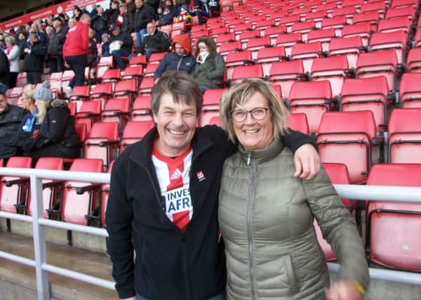 Roland and his wife at the Stadium of Light.