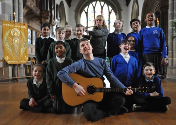 The Lake Poets Marty Longstaff with youngsters from Grangetown Primary and Hudson Road at Sunderland Minster, along with Janet Nettleton