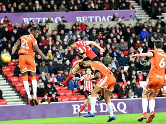 Jack Baldwin scores from a corner in the 1-1 draw with Blackpool.