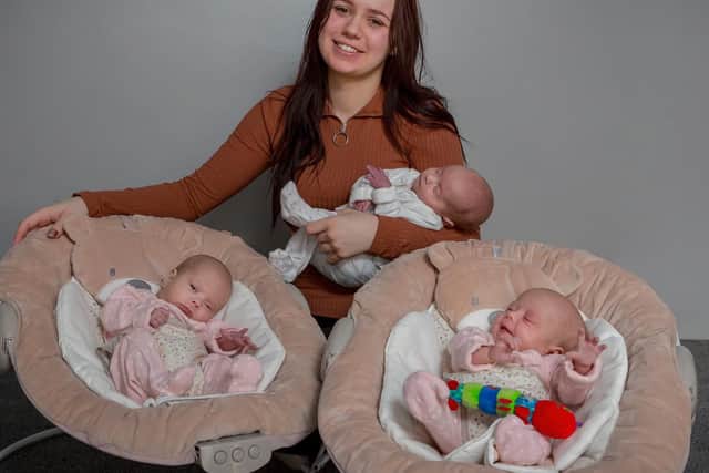 Triplets Jaxon, Alana and Aria with their mum, Chloe Bates.