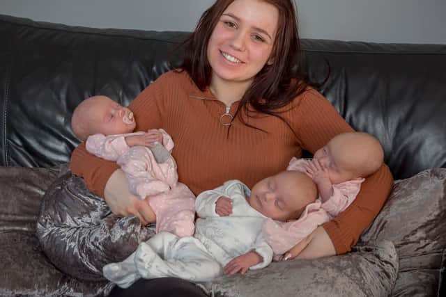 She certainly has her hands full: Chloe Bates who is balancing university studies while caring for new triplets Jaxon, Alana and Aria.