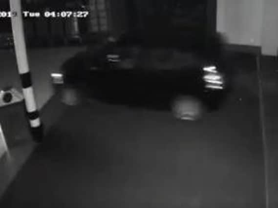 CCTV footage of the thieves driving into the shopping centre.