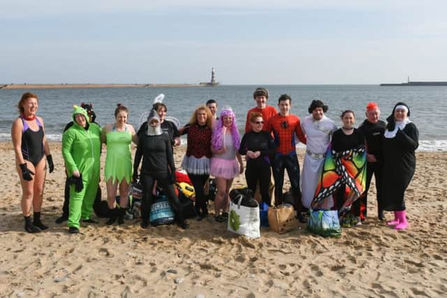 Michael Ward (fourth from right) and friends from Fausto Bathing Club took part in a fancy dress swim at Roker beach, Sunderland, to raise funds for a refugee charity in Algeria.
