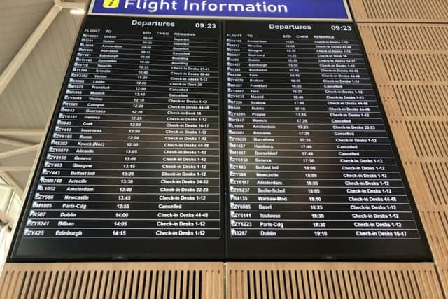 A departures board showed cancelled flights which were due to be run by Flybmi.
