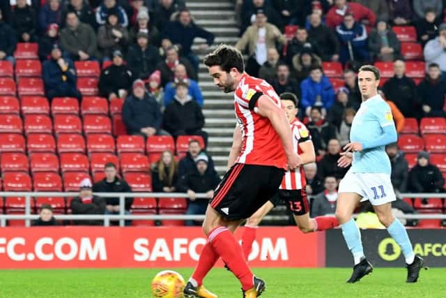 Will Grigg misses a chance against Accrington Stanley.