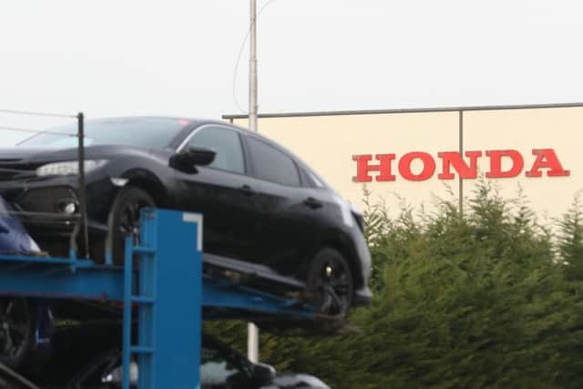 A car transporter at the Honda plant in Swindon, which the company is planning to close with the loss of more than 3,000 jobs. Pic: Steve Parsons/PA Wire.