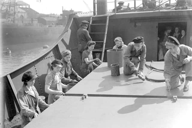 Women working as scrapers in Sunderland's Shipyards in July 1941