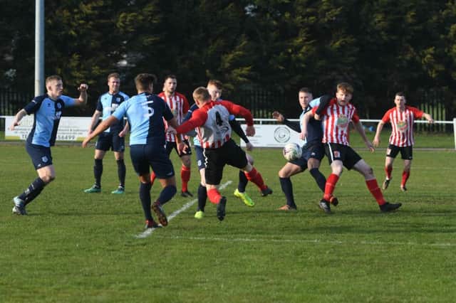 Sunderland RCA (red/white) v Bishop Auckland (blue) at Meadow Park, Ryhope on Saturday.