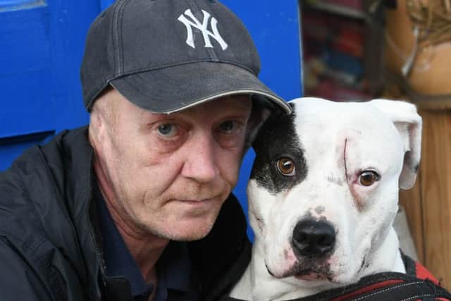 Gary Nichols with his dog Narni, which was stabbed.