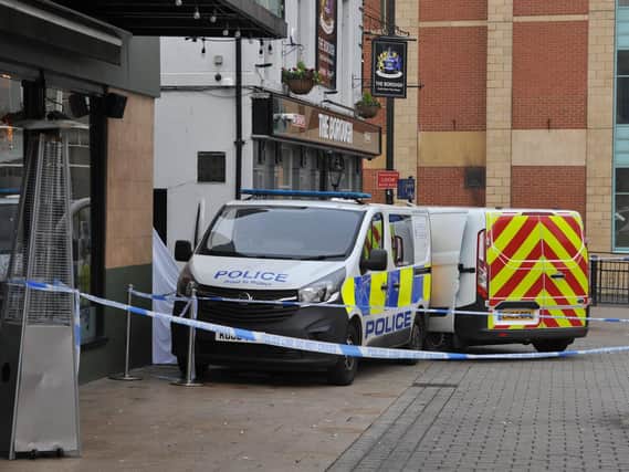 Police have sealed off part of the city centre while the murder investigation continues.