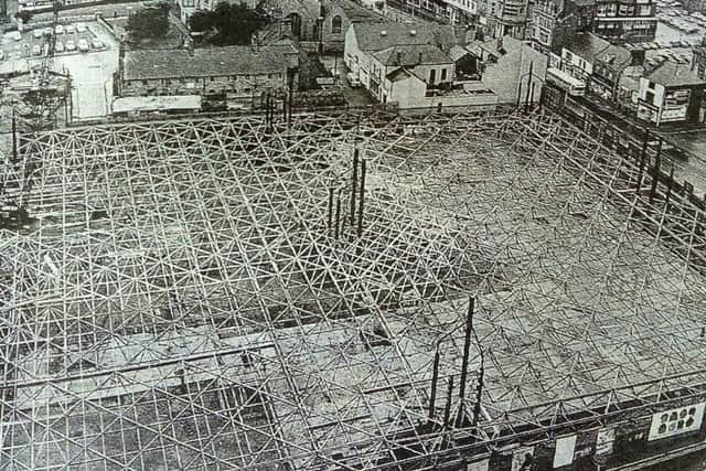 An aerial view of the roof under construction in 1975.