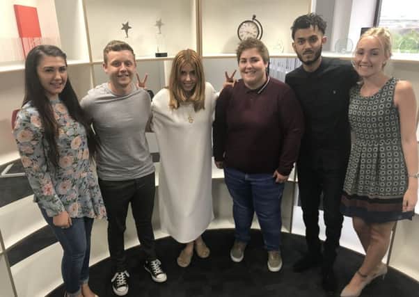 Stacey Dooley with five buddies from BGL Customer Services who each partnered up with one of the young people to show them the ropes