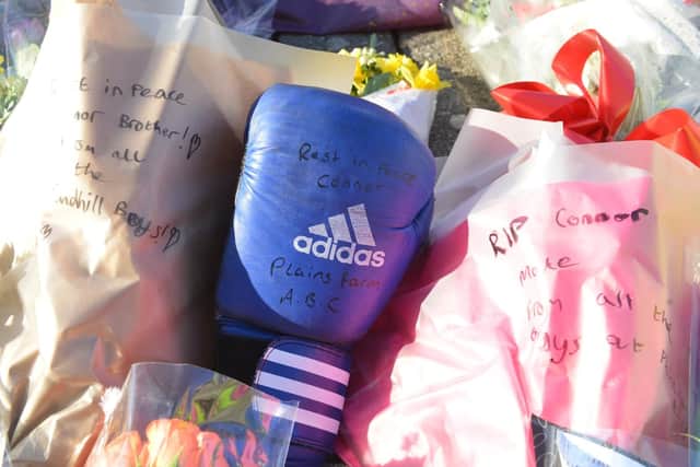 Tributes left to Connor Brown in Park Lane.