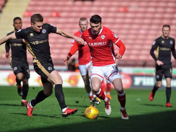 Barnsley striker Kieffer Moore has been ruled out for the season