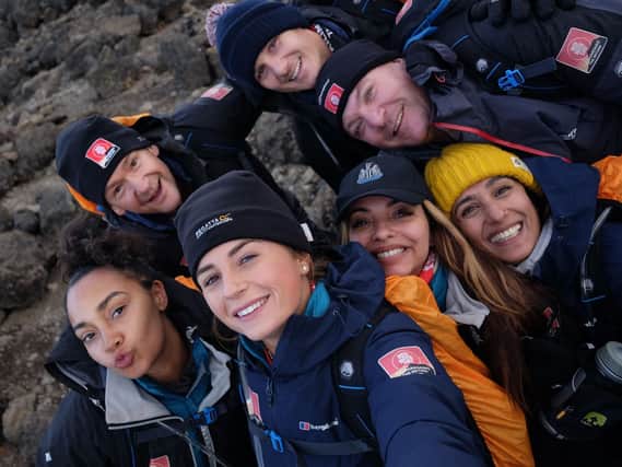 Members of Team Kilimanjaro pose for a selfie as the going gets even tougher on their climb for Comic Relief. Pic: Chris Jackson/Getty Images.