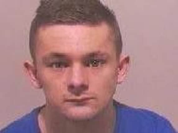 Liam Dixon has been jailed for two years and two months for affray, racially aggravated harassment, alarm or distress, criminal damage and two offences of assaulting a police officer.