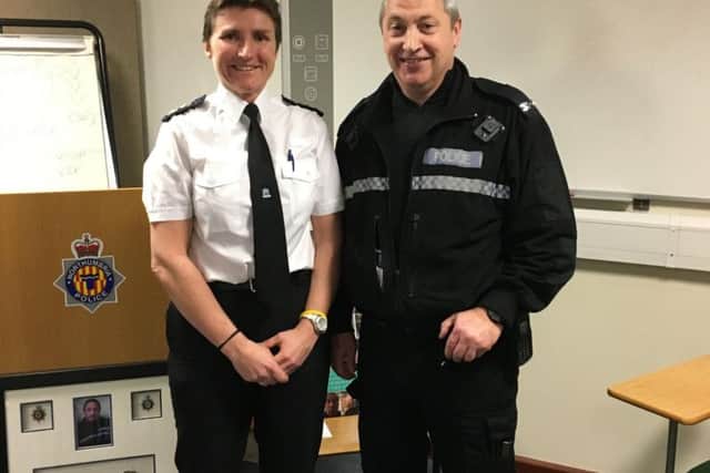 Pc Joe Lamb on his final day with the force, pictured with Chief Superintendent Sarah Pitt.